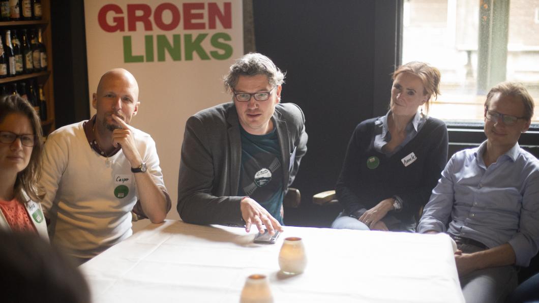 Groep mensen tijdens de stadsconferentie van GroenLinks Den Haag